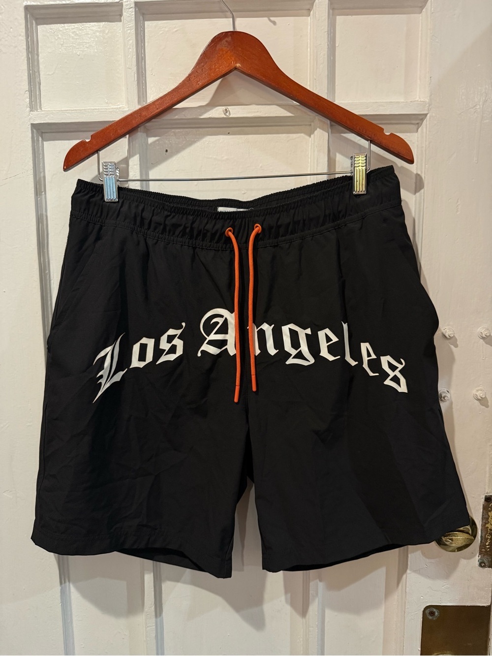 Primark Black Mesh Athletic Shorts with Small Orange Accent